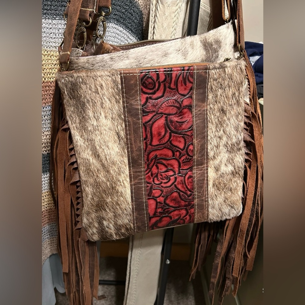 Genuine Cowhide and Rose Embossed Leather crossbody with Fringe